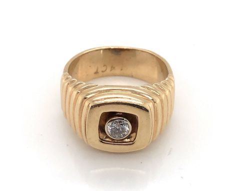 A GENTS DIAMOND SET SIGNET RING. THE CENTRAL RUBOVER DIAMOND INSET INTO A CUSHION SHAPED HEAD. APPROX DIAMOND WEIGHT 0.50cts.