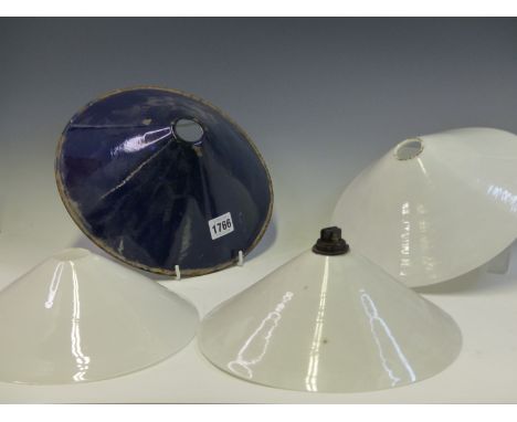 THREE MILK GLASS LIGHT SHADES TOGETHER WITH ANOTHER IN BLUE AND WHITE ENAMEL. Dia. 26cms.
