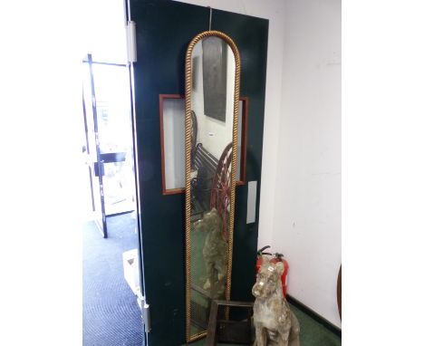 A PAIR OF TALL NARROW GILT ARCH TOP PIER MIRRORS WITH ROPE TWIST FRAMES. H 214. W 36cms (2)