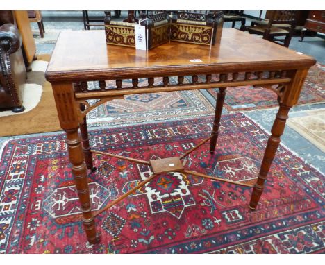 A LATE 19th C. OAK TABLE, THE RECTANGULAR TOP WITH PARQUETRY SQUARES ABOVE A BALUSTRADE APRON, THE RING TURNED LEGS JOINED BY