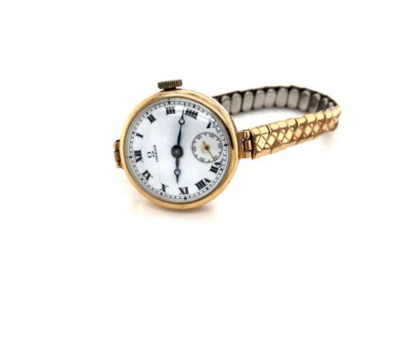 A VINTAGE 9ct GOLD HALLMARKED LADIES OMEGA MANUAL WOUND WATCH. THE REVERSE INSIDE CASE HALLMARKED 1929, BIRMINGHAM. THE MOVEM