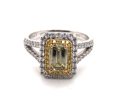A TRESOR PARIS YELLOW AND WHITE DIAMOND RING. THE PRINCIPLE YELLOW DIAMOND APPROX 1.04cts. UNHALLMARKED, THE SHANK ENGRAVED 7