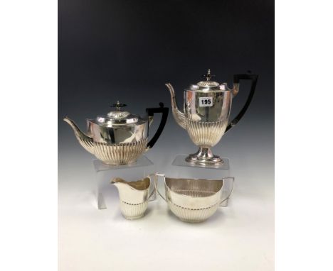 A MATCHED SILVER FOUR PIECE TEA AND COFFEE SET, THE TEA POT, TWO HANDLED SUGAR AND MILK JUG BY WILLIAM HUTTON, LONDON 1895 AN