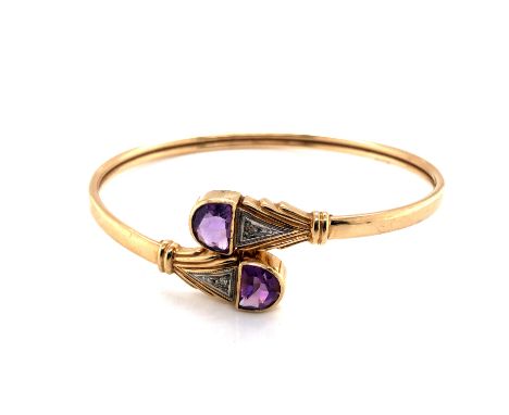 A 9ct HALLMARKED GOLD, AMETHYST AND DIAMOND FLEXI BANGLE. WEIGHT 8.88grms. 