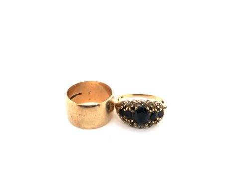 A HALLMARKED 9ct GOLD SAPPHIRE AND DIAMOND DRESS RING, FINGER SIZE T, TOGETHER WITH A 9ct GOLD WIDE WEDDING RING, FINGER SIZE