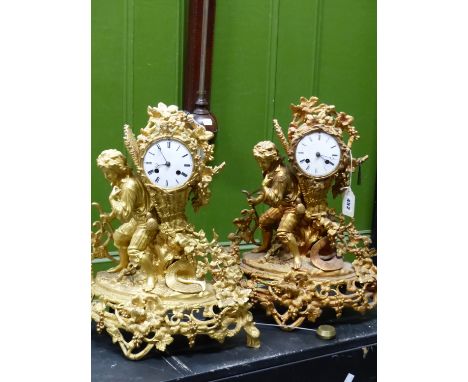 A PAIR OF 19th C. ORMOLU CASED CLOCKS BY MIROY FRERES, THE MOVEMENT STRIKING ON A BELL, THE CIRCULAR ENAMEL DIAL FRAMED BY GR