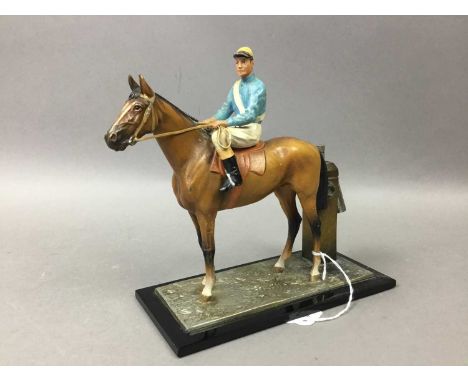 PAINTED SPELTER HORSE WITH JOCKEY UP TABLE LIGHTER on an oblong base