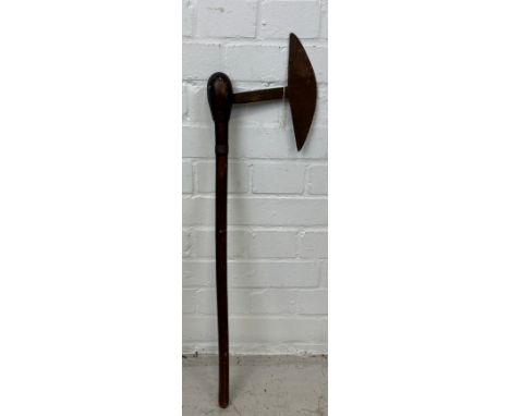 A TRIBAL AXE, 74cm L 