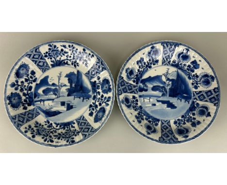 A PAIR OF CHINESE BLUE AND WHITE KANGXI PERIOD PLATES, Leaf mark to verso. 26cm D each. 