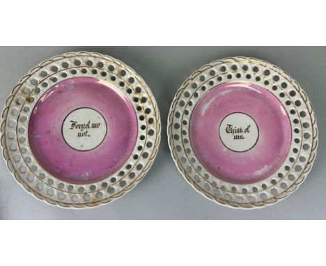 A PAIR OF VICTORIAN LUSTRE PLATES, 'Forget me not' and 'Think of me'. 20cm D each. 