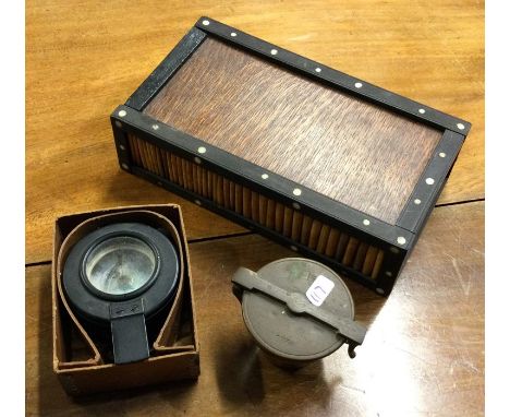 An old travelling compass, by T&amp;G Company etc. Est. £20 - £30.