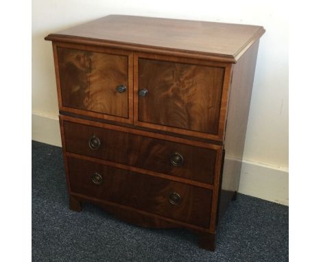 A good late Georgian flame mahogany commode of typical form to shaped base. Est. £50 - £80.