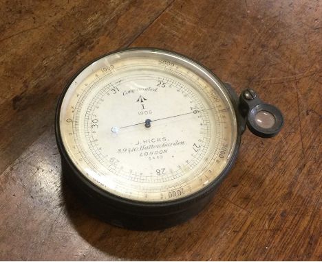 A leather cased travelling barometer by J Hicks of London. Est. £30 - £50.