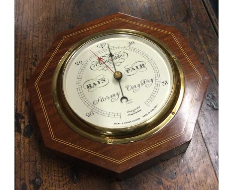 An Edwardian wall mounted barometer. By Short &amp; Mason of London. Est. £30 - £50.