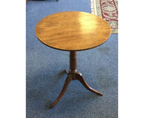 A Victorian mahogany circular tripod table on three spreading supports. Est. £30 - £50.