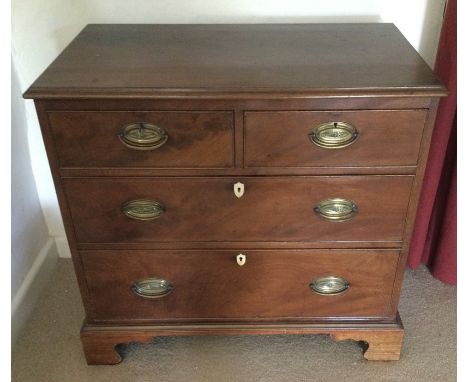 A good Antique mahogany four drawer chest on shaped bracket feet. Est. £80 - £120.