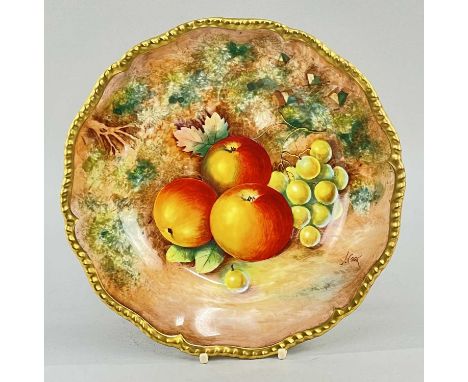 ROYAL WORCESTER BONE CHINA FRUIT PAINTED PLATE BY JOHN COOK, decorated with autumn fruit on a mossy ground, shaped gadrooned 