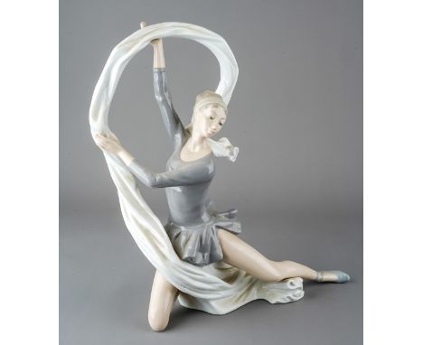 A large Nao figure titled: Dancer with veil, approx 35cm high, in original box  damage to box