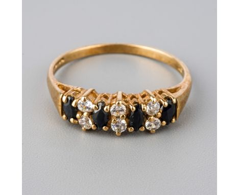 A 9ct yellow gold sapphire and CZ ring, size P, total gross weight approx 1.8g  Good, wear commensurate with age