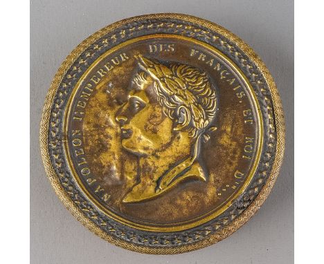 A 19th Century French Napoleonic leather and brass circular snuff box with profile of Emperor Napoleon, approx 8cm diam  