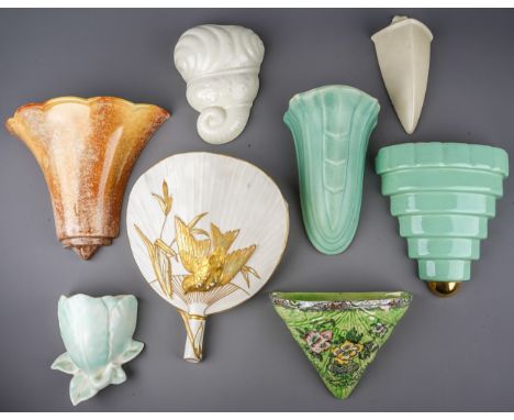 A collection of ceramic early 20th Century wall pockets, various designs and shapes including Japanese style fan shaped with 