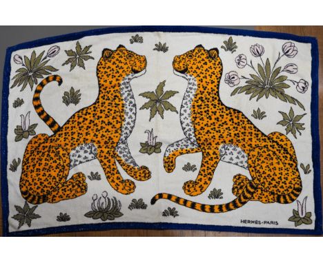 A vintage Hermes beach towel depicting leopards, label to reverse  wear commensurate with age and use