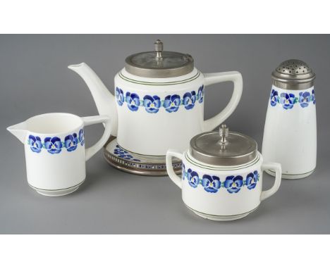 An early 20th Century German Wächtersbach Blue Pansy chrome mounted ceramic breakfast set, to include teapot and stand, two h