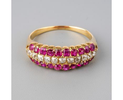 A yellow gold ruby and diamond ring, set with old-cut diamonds flanked by two rows of mixed-cut rubies, size P, unmarked, ass