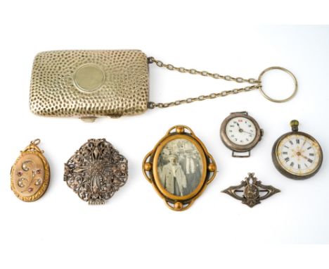 A Swiss 800 silver ladies fob watch; a silver wristwatch case (no strap); a silver brooch; a gilt metal locket pendant; a gil