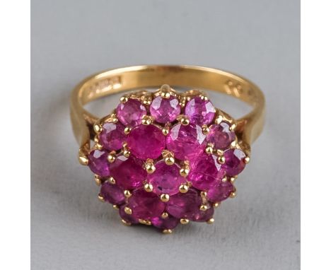 A 9ct yellow gold and pink sapphire cluster ring, set with round-cut stones, ring size N1/2, total gross weight approx 4.1g  