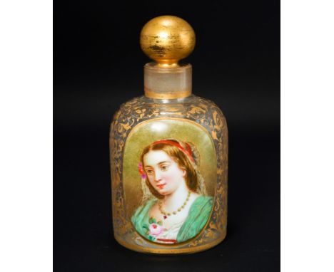 A 19th century continental glass scent bottle, having a raised oval plaque enameled with a portrait of a lady, gilt foliate d
