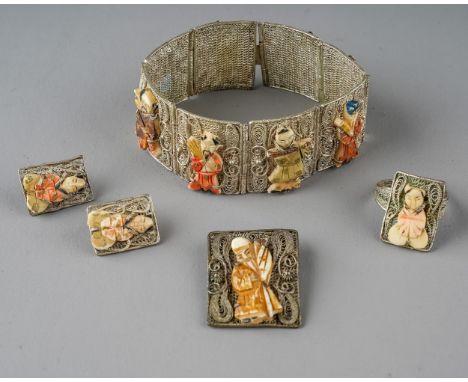 A suite of Chinese silver filigree jewellery, to include bracelet, ring, earrings and brooch, all applied with bone figures o