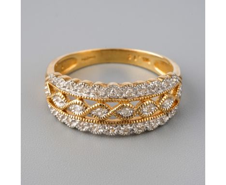 A 9ct yellow gold and diamond dress ring, size P, diamond weight stamped to shank 0.14ct, total gross weight 3.2g  Good condi
