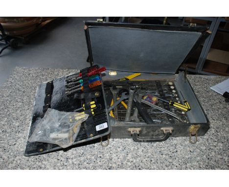 A briefcase style tool case, a/f and a good quantity of mixed tools.