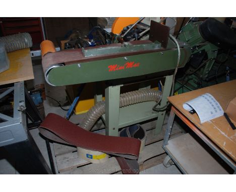 A "Mini max" three phase Belt and Disc Sander on stand and spare abrasive belts.