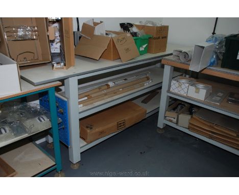 A three shelf, four-legged Bench/table with adjustable feet.