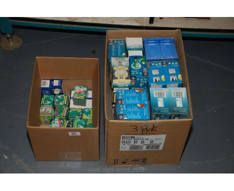 Two boxes of light bulbs.