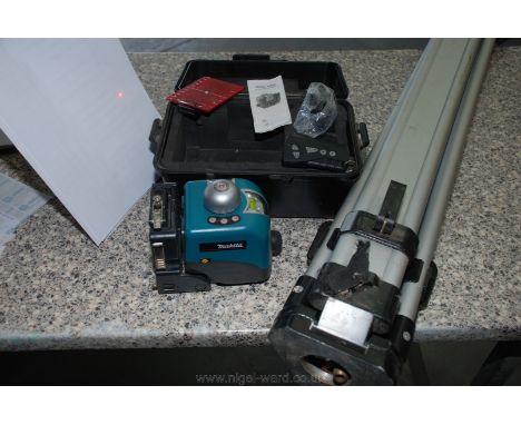 A boxed "Makita SKR 60" Rotating Laser Level and tripod in working order.