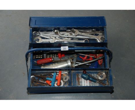 A metal Toolbox and contents inluding spanners, grease gun, turn-keys, etc.,