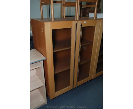 A frosted glazed two-door, two shelf Cabinet, 1 m. wide x 1.4 m. high x 59 cms. deep, approx.