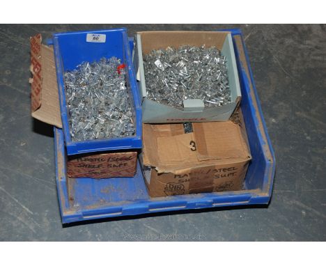 A quantity of Shelf metal and plastic support pegs.