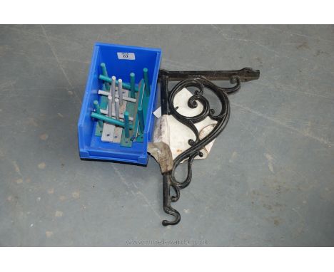 A Lin-bin of six Brackets and a hanging scrolled aluminium Bracket.