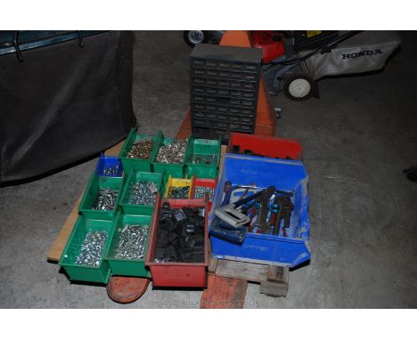 Lin-bins containing tools, furniture feet, "Tek" screws, nuts and bolts, washers, etc., and a small multi-drawer storage cabi