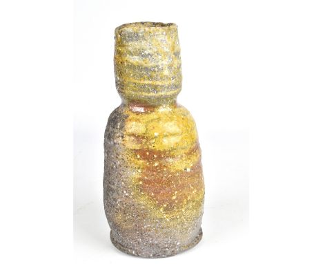 UWE LOELLMANN (born 1955); a wood fired stoneware bottle, impressed mark, height 23cm. (D)Born in Germany Loellmann's work is