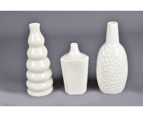 IKUKO IWAMOTO (born 1971); three small slip cast porcelain bottles, painted marks, tallest 15cm (3).Born in Japan and educate