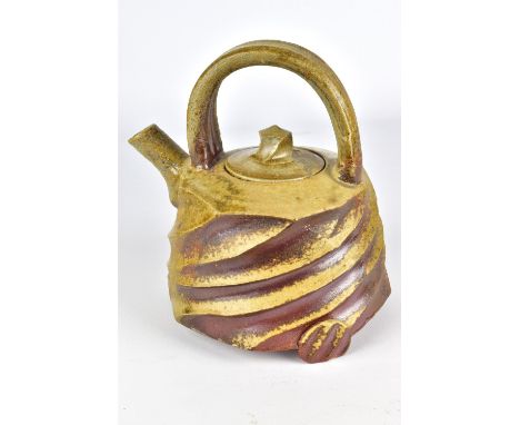 DAVID CARADORI (born 1959); a faceted wood fired stoneware teapot, impressed marks, height 18.5cm.Provenance: Purchased in 20