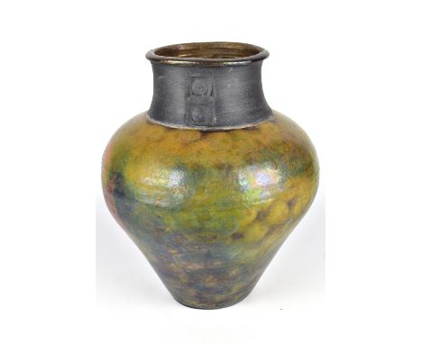 TERRY CROOK; a raku vase, incised signature, height 28.5cm.Crook is based in North Boulder, Colorado.Additional InformationAp