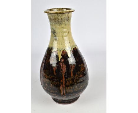 JIM MALONE (born 1946); a stoneware bottle of Korean form covered in tenmoku and nuka glaze, impressed JM and A (for Ainstabl