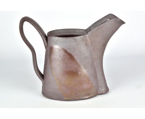 BRUCE COCHRANE; a wood fired stoneware pitcher, incised signature, height 18.5cm.Cochrane is based in Mississauga, Ontario.Pr
