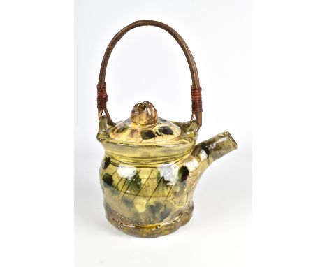 JEAN-NICOLAS GERARD (born 1954); a slipware teapot with willow handle and sgraffito and finger spot decoration, incised signa